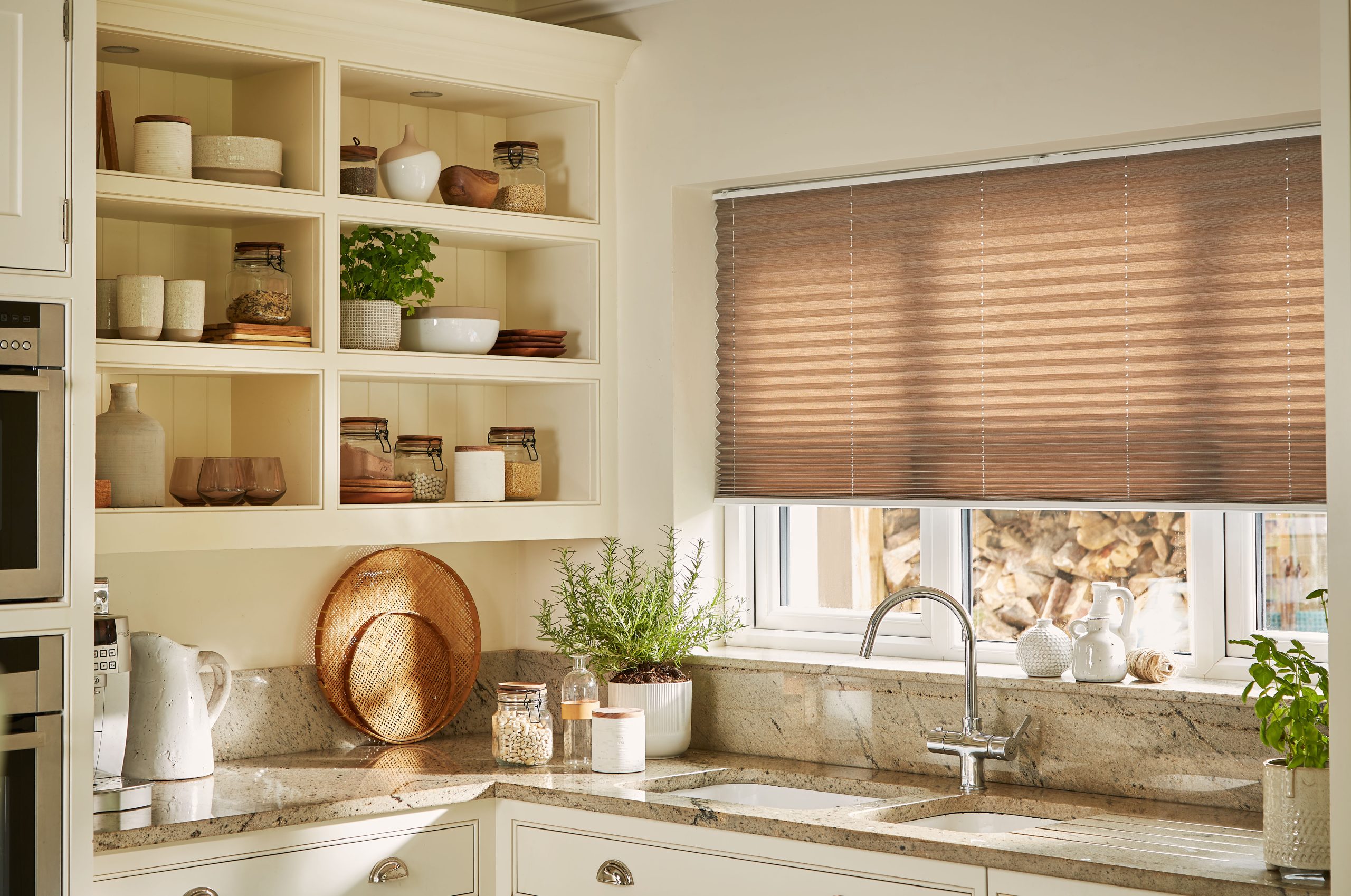 Pleated blinds in chocolate tone within a styled interior