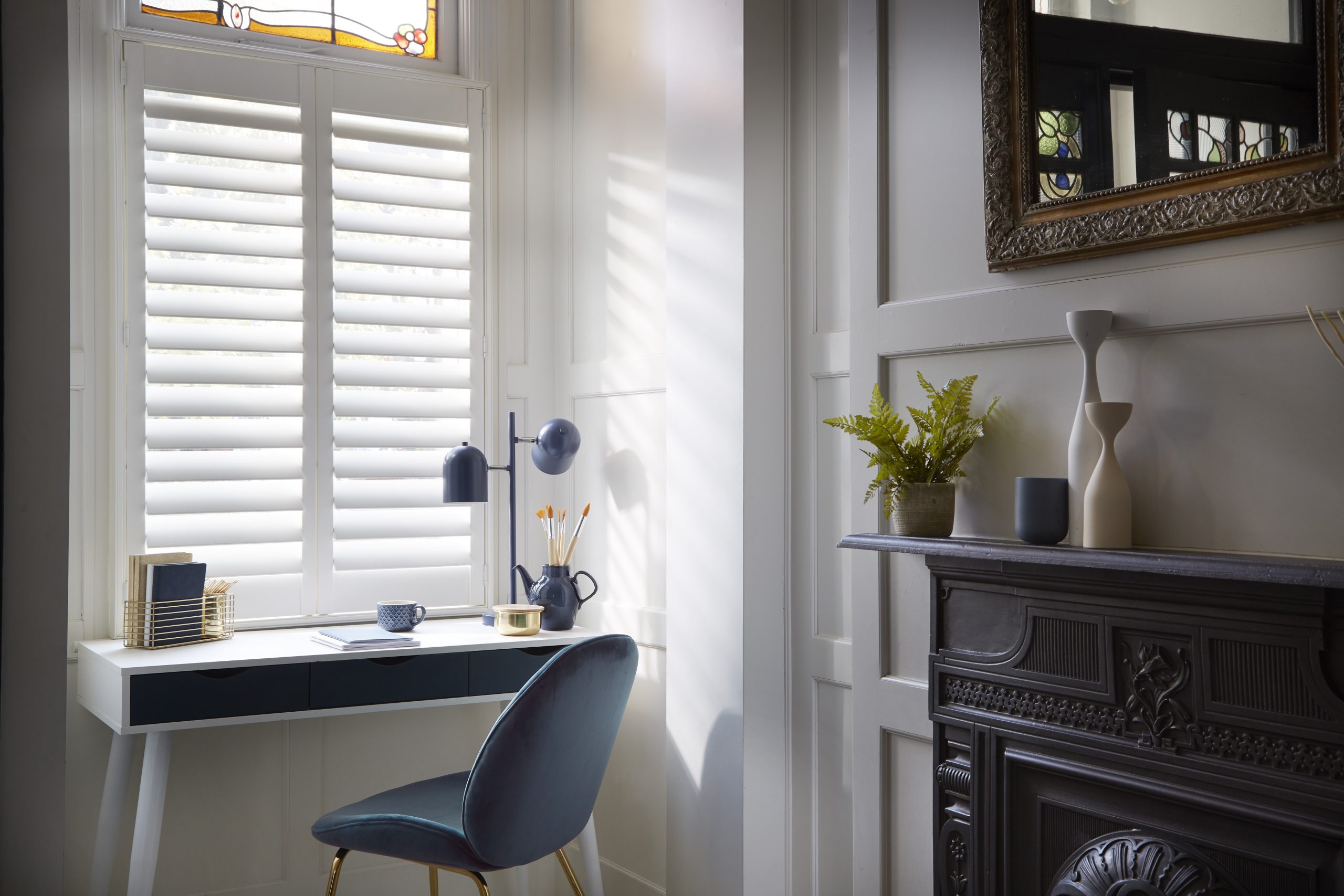 Warm living room with bay shutters